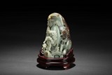 A CARVED CELADON JADE BOULDER 'SHANZI'