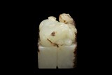 A CARVED WHITE JADE 'BEAST' SEAL STAMP
