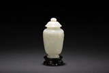 A WHITE JADE BOTTLE VASE WITH COVER