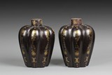 A PAIR OF MELON FORM LACQUER BOTTLES WITH LIDS
