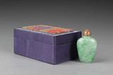 A JADEITE SNUFF BOTTLE WITH BOX