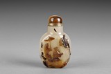 A CARVED AGATE SNUFF BOTTLE