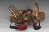 A RARE CARVED GILT BRONZE 'DRAGON' HORSE SADDLE SET