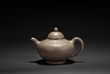SHEN XI: A GREEN CLAY 'CHRYSANTHEMUM' TEAPOT