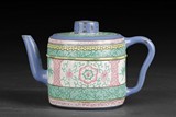A PAINTED ZISHA STONEWARE 'FLOWERS' TEAPOT