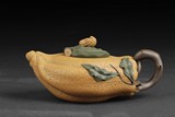 A YELLOW CLAY 'BUDDHA'S HAND' TEAPOT