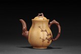 A YELLOW CLAY ‘PLUM BLOSSOM' WINE POT