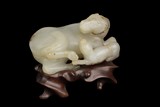 A WHITE JADE CARVING OF TWO HORSES