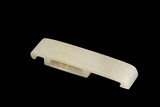 A WHITE JADE CARVING OF SCABBARD BUCKLE