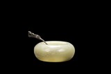 A CARVED CELADON JADE WASHER