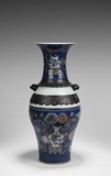 A BLUE GROUND FAMILLE ROSE VASE