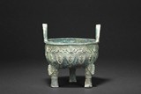 AN ARCHAIC INSCRIBED BRONZE RITUAL VESSEL, DING