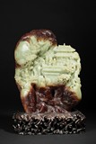 AN IMPORTANT CELADON JADE CARVED 'MOUNTAINS AND PAVILLIONS' SHANZI