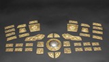 A SET OF FORTY-ONE GILT BRONZE CHINESE ARMOR PARTS
