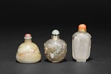 A GROUP OF THREE GLASS SNUFF BOTTLES