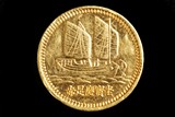 A VINTAGE CHINESE GOLD COIN