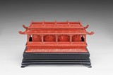 A CINNABAR LACQUER CARVED PAVILION