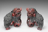 A PAIR OF WOOD CARVED LIONS