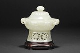 A WHITE JADE CARVED CENSER WITH COVER