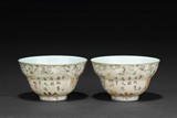 A PAIR OF 'POEMS' PORCELAIN WINE CUPS