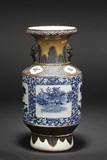 A BLUE AND WHITE CRACKLEWARE VASE WITH LION MASK HANDLES