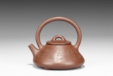 YANG PENGNIAN: AN INSCRIBED YIXING TRIPOD TEAPOT