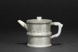 YANG PENGNIAN: A PEWTER-ENCASED YIXING TEAPOT AND COVER