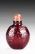 A RUBY-RED GLASS SNUFF BOTTLE