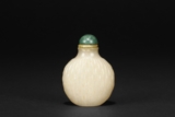 A CARVED CELADON JADE ‘BAMBOO' SNUFF BOTTLE