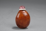 A BROWNISH HARD STONE SNUFF BOTTLE