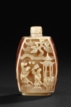 A FINE CARVED HORNBILL SKULL SNUFF BOTTLE