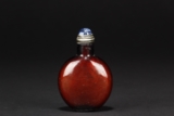 A TEA-BROWN GLASS SNUFF BOTTLE