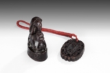 A BUFFALO HORN CARVED STAMP SEAL AND PENDANT