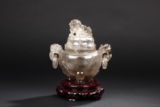 A CARVED CRYSTAL TWO-HANDLED TRIPOD CENSER