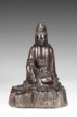 A CARVED LONGYAN WOOD FIGURE OF GUANYIN