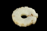 A WHITE JADE DRAGON PENDANT