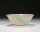 A CARVED JADEITE BOWL