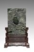 A CARVED SPINACH-GREEN JADE 'CRANE' RECTANGULAR TABLE SCREEN