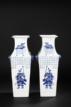 A PAIR OF BLUE AND WHITE 'WU SHUANG FIGURES' VASES
