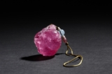 A CARVED PINK TOURMALINE ORNAMENT