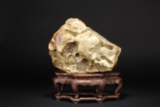 AN IMPERIAL INSCRIBED YELLOW AND RUSSET JADE BOULDER