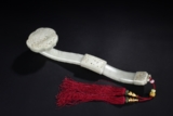 A PIERCE CARVED WHITE JADE 