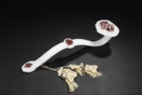 A RED OVERLAY WHITE GLASS RUYI SCEPTER