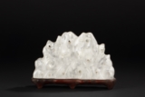 A CARVED ROCK CRYSTAL BRUSH REST