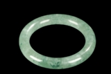 A ROUND JADEITE BANGLE