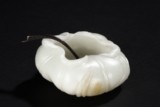 A CARVED WHITE JADE 