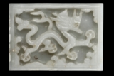 A CARVED WHITE JADE 