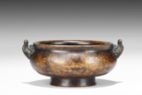 A BRONZE CENSER WITH TWO ELEPHANT-SHAPED HANDLES