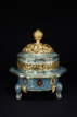 A LARGE GILT-BRONZE CLOISONNE ENAMEL TIERED CENSER AND COVER