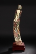 A LARGE PAINTED IVORY FIGURE OF GUANYIN